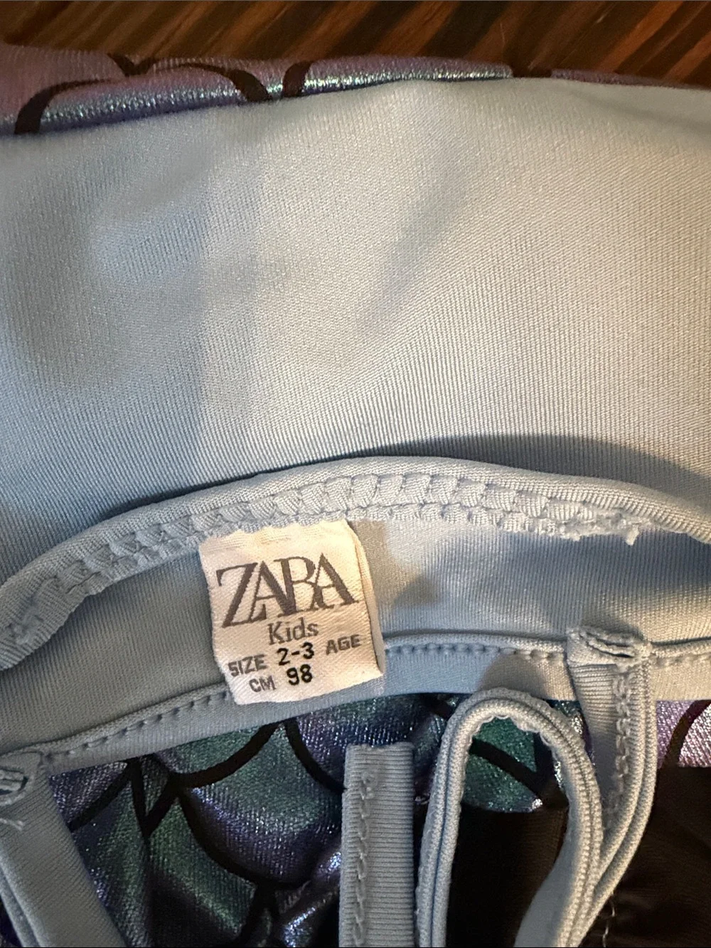 Zara Iridescent Purple Mermaid-Scale One-Piece Swimsuit with Light Blue Top